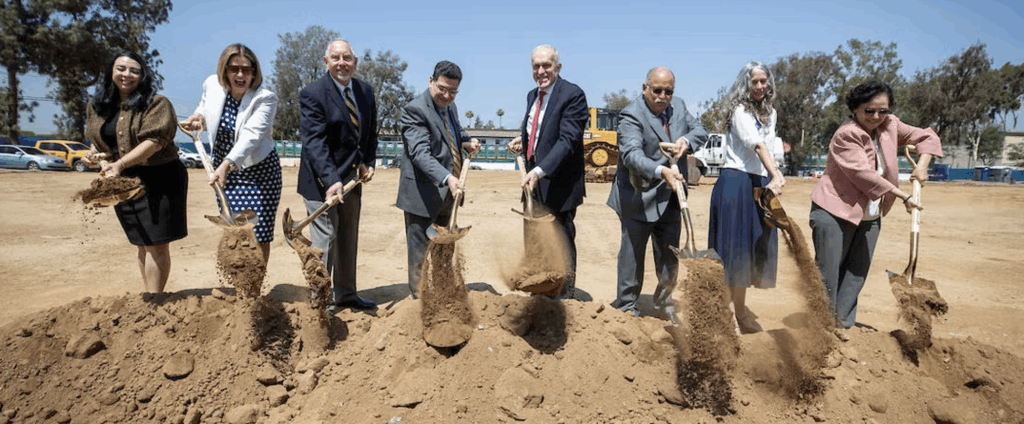 Ceremmonial shovel-digging in sand